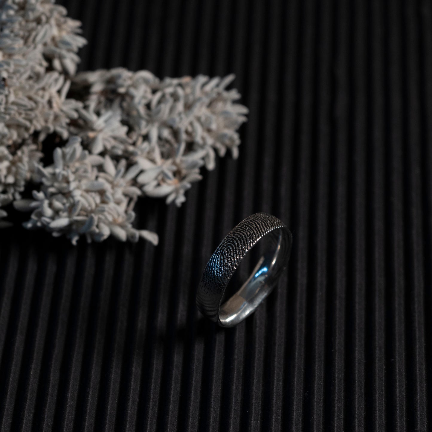 Detail of fingerprint on sterling silver ring