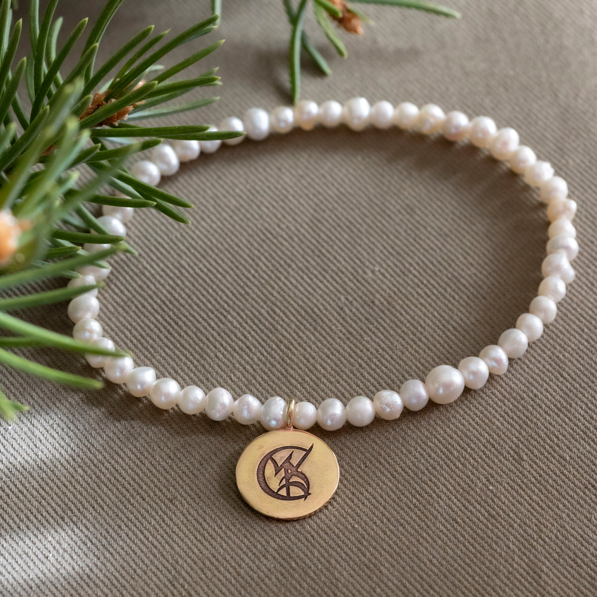 Tessa Gray Pearl Stretchy Bracelet with Brass Wedded Union Rune Medal - Hebel Design