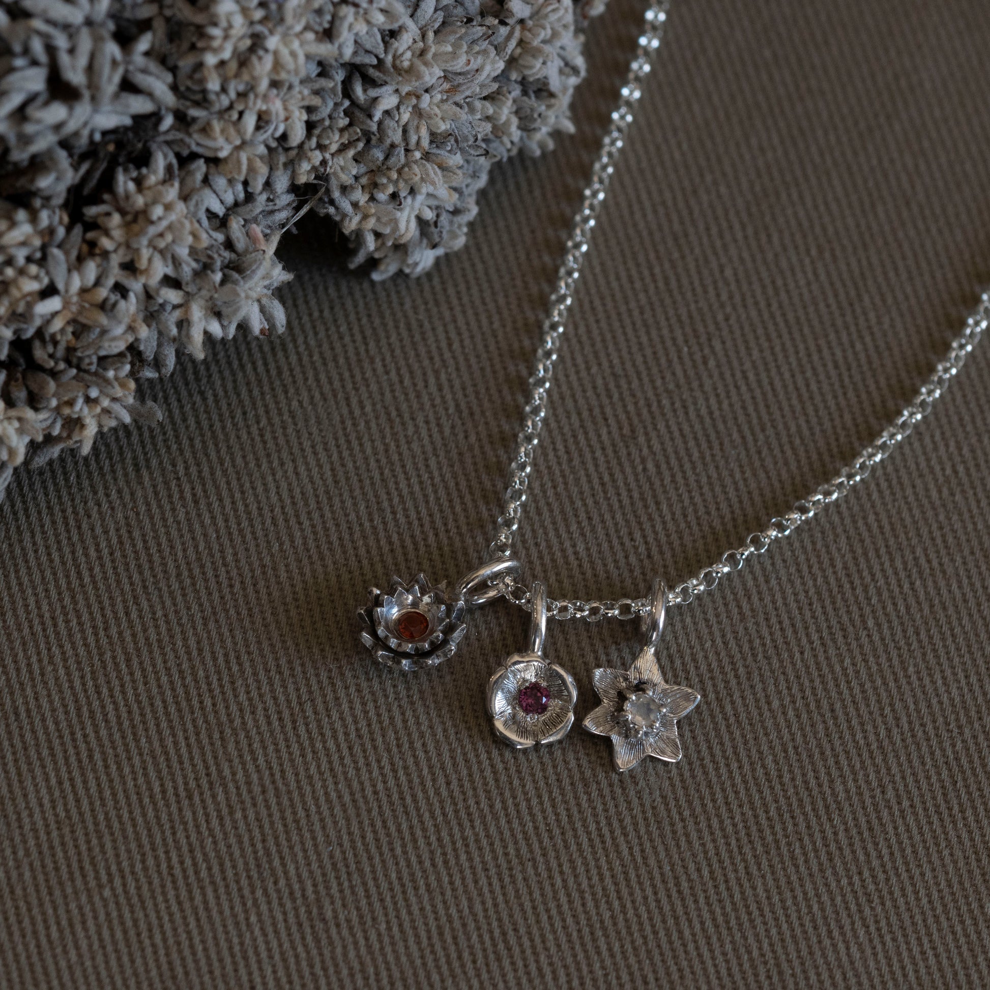 the monthly bloom is a collection of pieces inspired by birthstones and flower