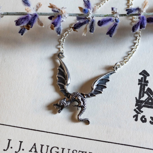 Little dragon necklace in recycles sterling silver