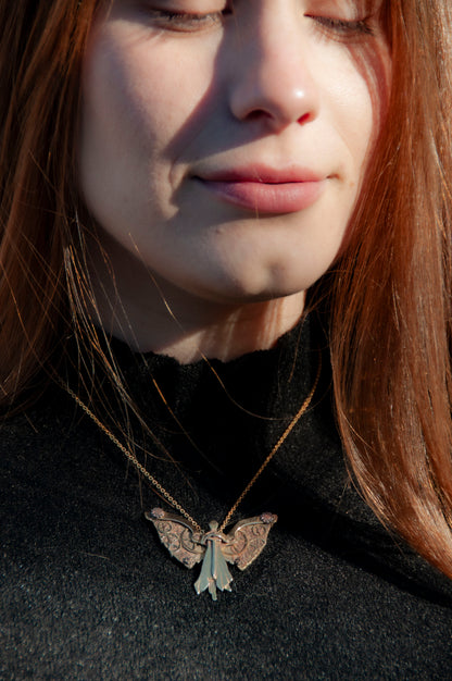 model wearing tessa's clockwork angel necklace