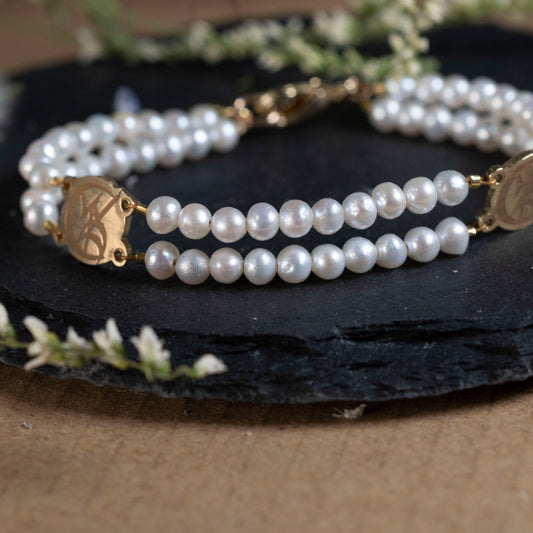 Tessa's pearl bracelet inspired by The Infernal Devices, with smaller pearls and Wedded Union Runes